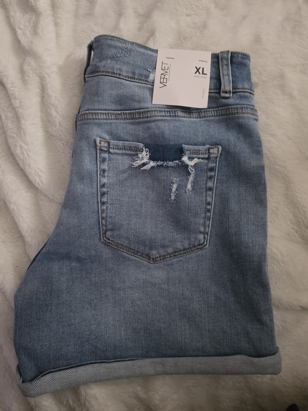 Women’s Light Blue Distressed Denim Roll-Cuff Shorts - Picture 5 of 5